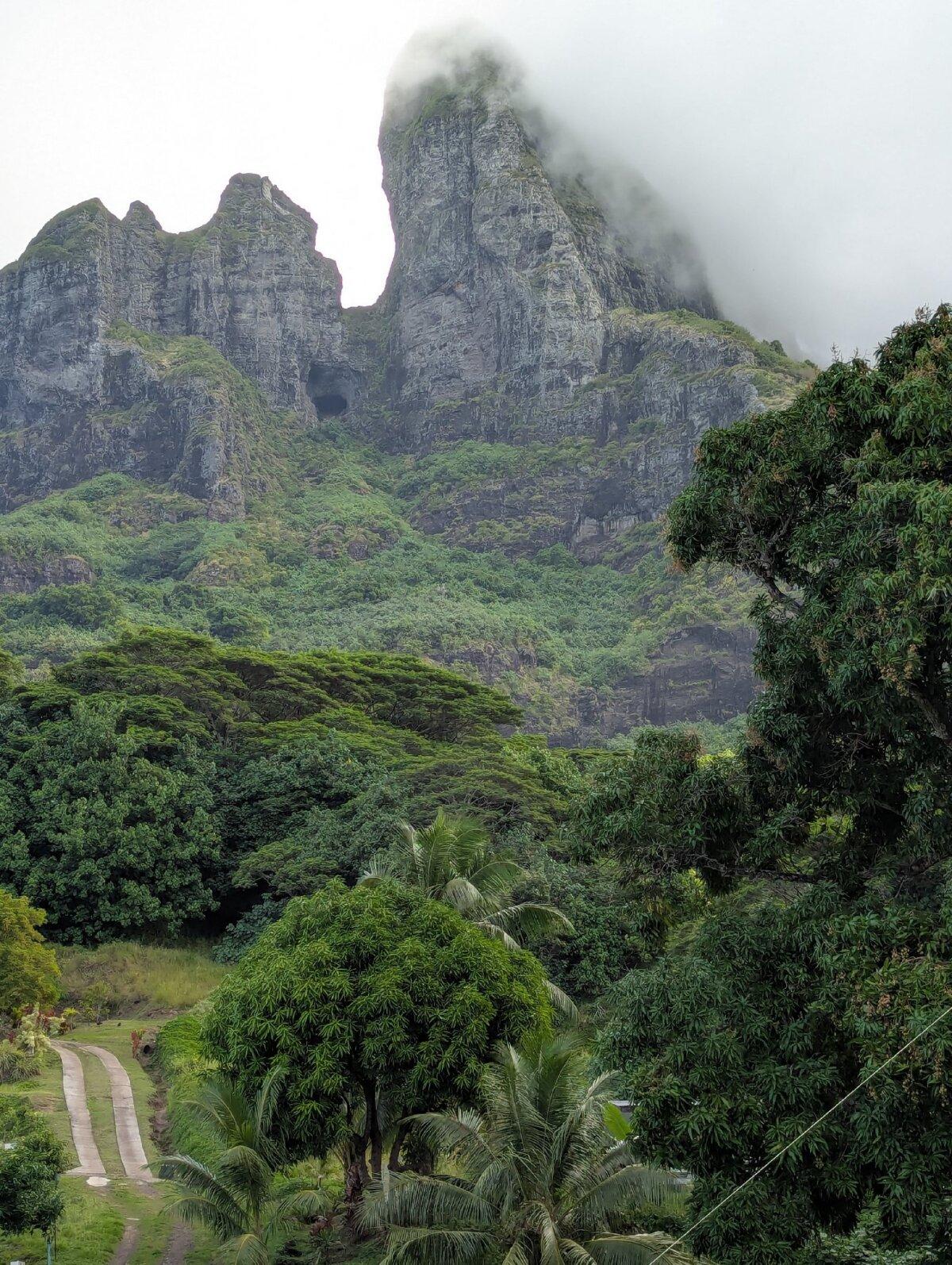 In the middle of Bora Bora, Mount Otemanu (2,385 feet) and Mount Pahia (2,169 feet) are remnants of an extinct volcano. (Athena Lucero)