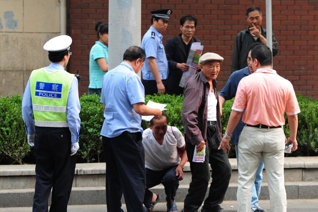 China Cuts 300,000 Enforcement Officers Amid Complaints of Abuse, Mounting Fiscal Stress