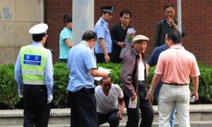 China Cuts 300,000 Enforcement Officers Amid Complaints of Abuse, Mounting Fiscal Stress