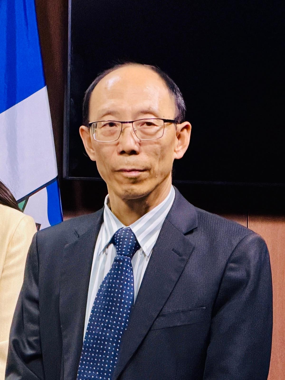 He Lizhi, a Falun Dafa practitioner who was persecuted in China, speaks at a press conference on Parliament Hill in Ottawa on May 28, 2026 (The Epoch Times)