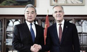 Carney Meets With Chinese Foreign Affairs Minister, Offers No Comments