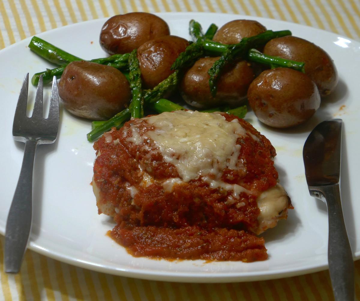 Savory Oven-Baked Chicken Thighs With Roasted Potatoes and Asparagus