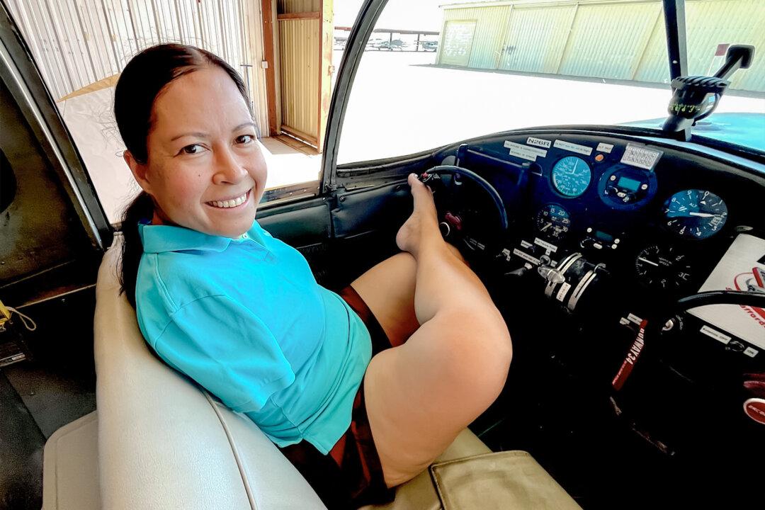 (Top) Jessica Cox balances on a wing as she enters the cockpit of a 1946 Ercoupe light aircraft in Marana, Ariz., on May 22, 2026. (Bottom) Jessica Cox sits in the cockpit of a vintage aircraft in Marana Ariz., on May 22, 2026. (Allan Stein/The Epoch Times)