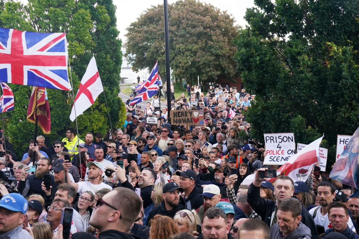 People protest at the death of Henry Nowak outside a police station in Southampton, England, on June 2, 2026. (Gareth Fuller/PA via AP)
