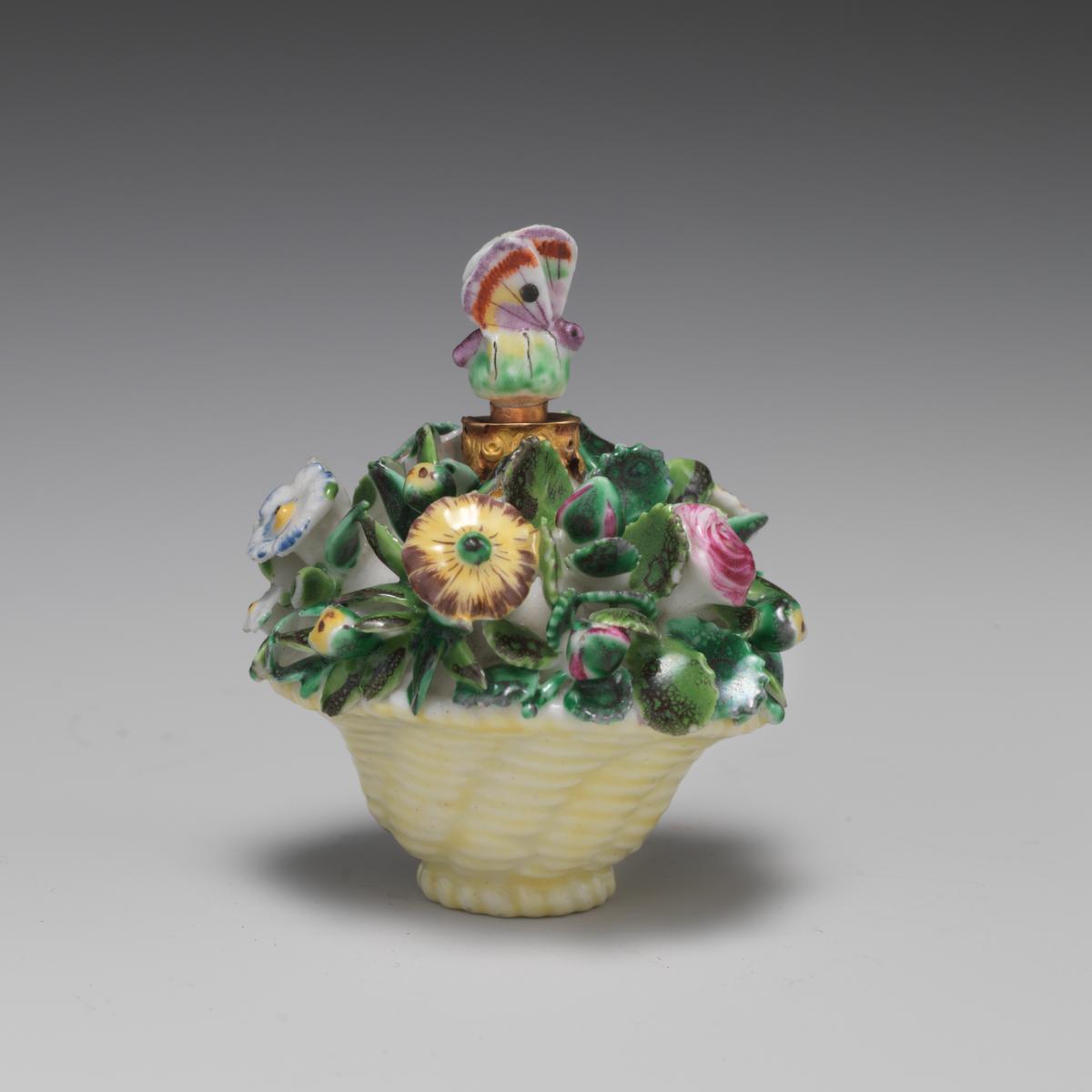 Basket of flowers, circa 1755, by Saint James's Factory in London. Soft-paste porcelain; 2 1/4 inches by 1 7/8 inches. Metropolitan Museum of Art, New York City. (Public Domain)