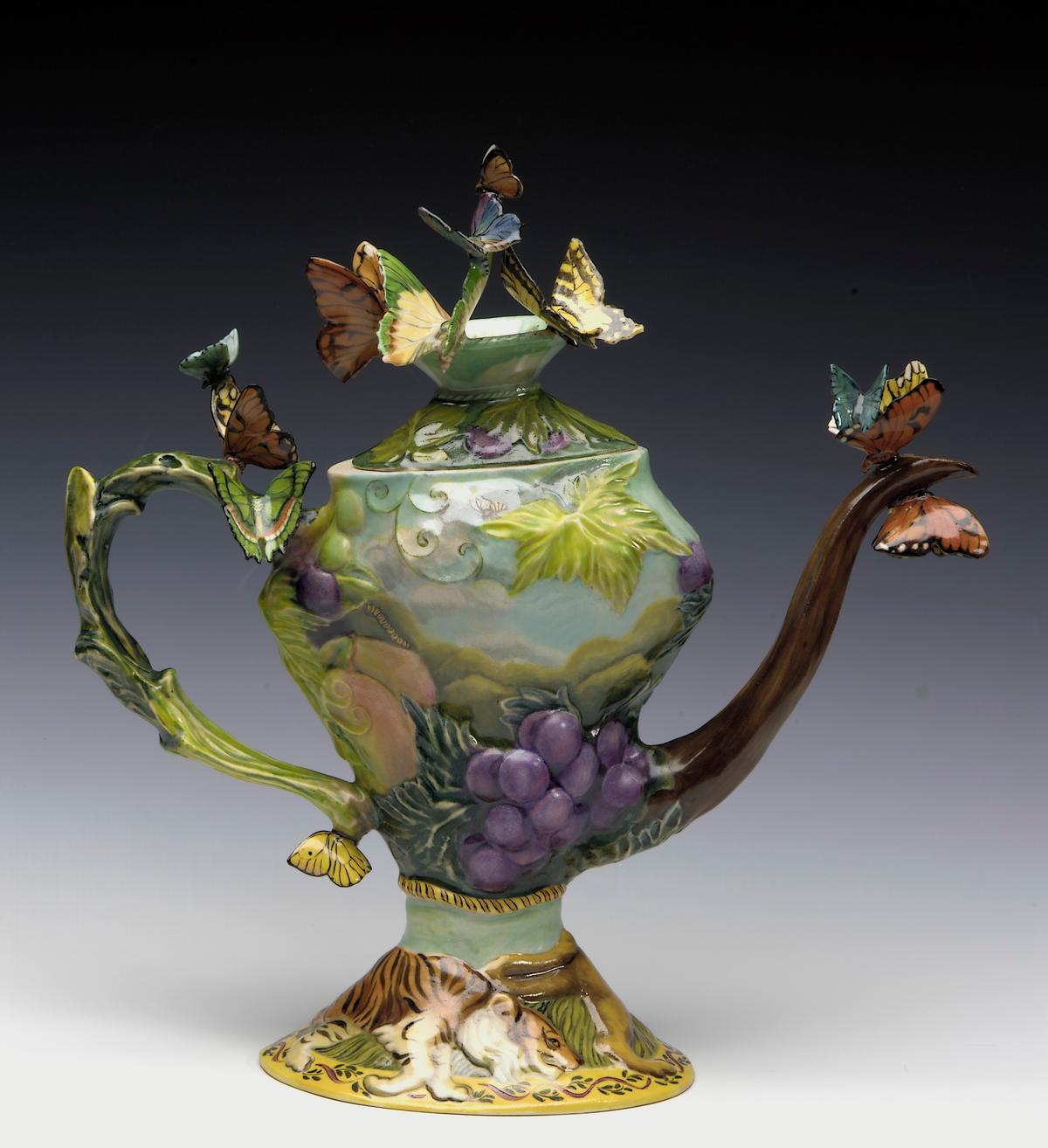 "Washday Miracle," 1997, by Susan Thayer. Glazed porcelain; 11 3/8 inches by 11 1/4 inches by 4 1/4 inches. What looks like a teapot turns out to be a whole world, with tigers at the base and butterflies poised at the spout as if ready to leave it. Smithsonian American Art Museum, Washington. (Public Domain)
