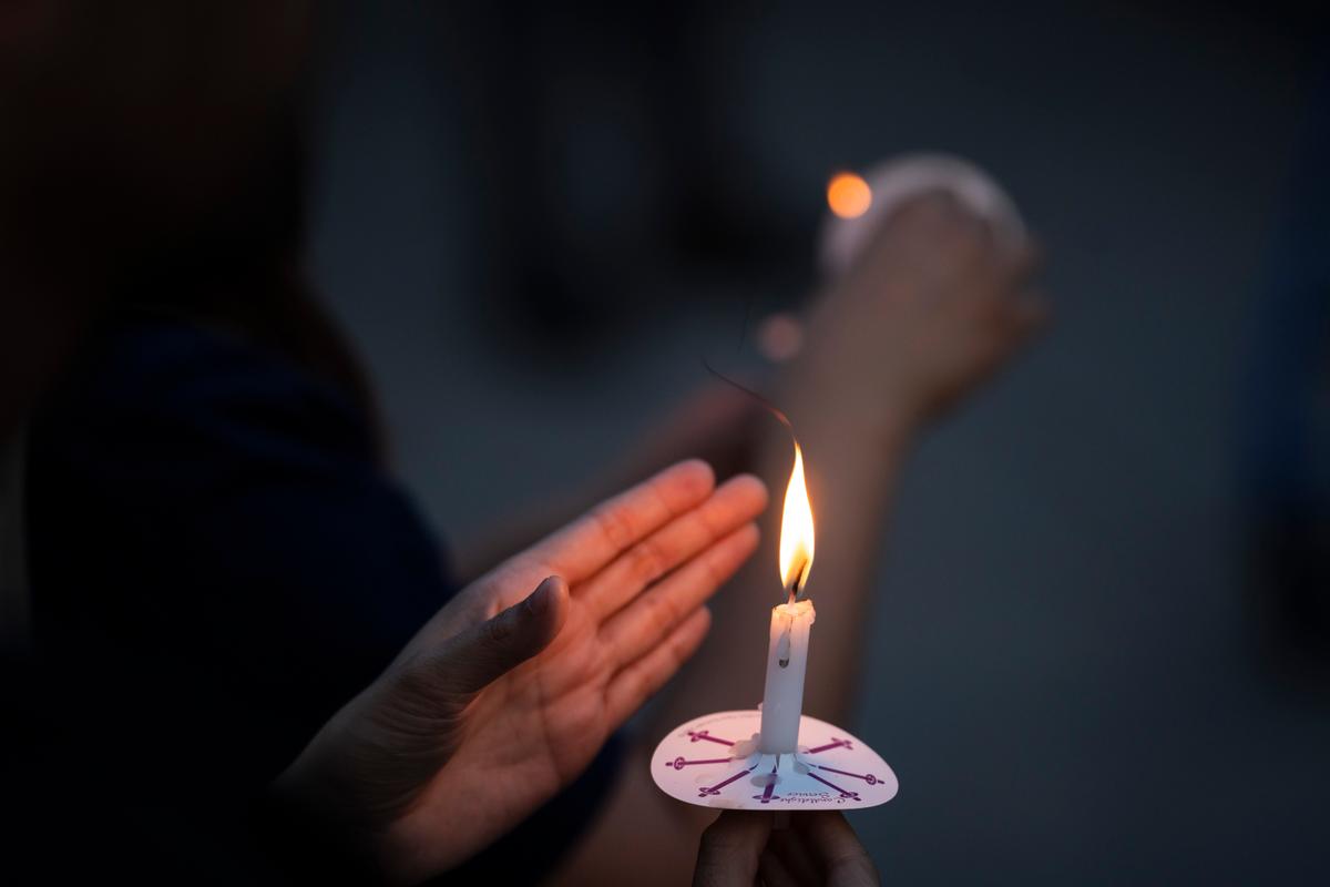 Tiananmen Square massacre candlelight vigil held at the Victims of Communism Memorial in Washington on June 4, 2026. (Madalina Kilroy/The Epoch Times)