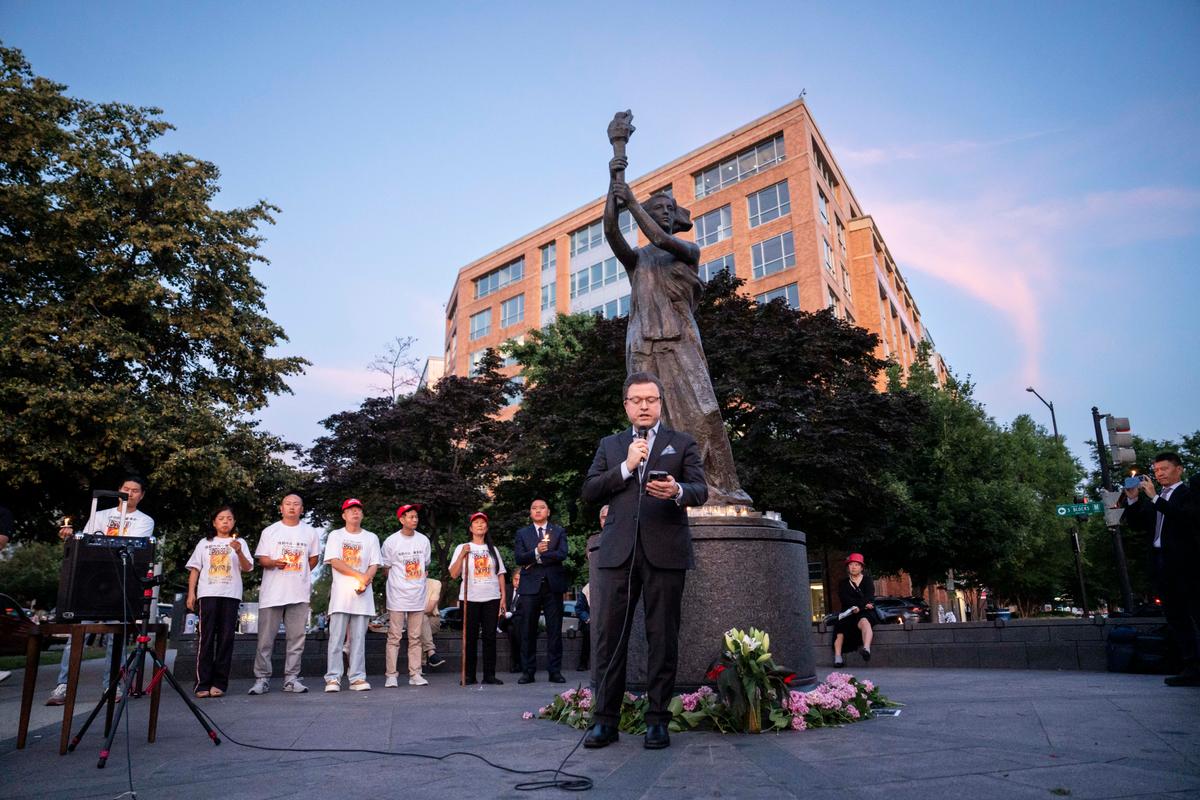 Jan Jekielek, Epoch Times senior editor, host of American Thought Leaders, and author of the book “Killed to Order,” speaks during the Tiananmen Square massacre candlelight vigil held at the Victims of Communism Memorial in Washington on June 4, 2026. (Madalina Kilroy/The Epoch Times)