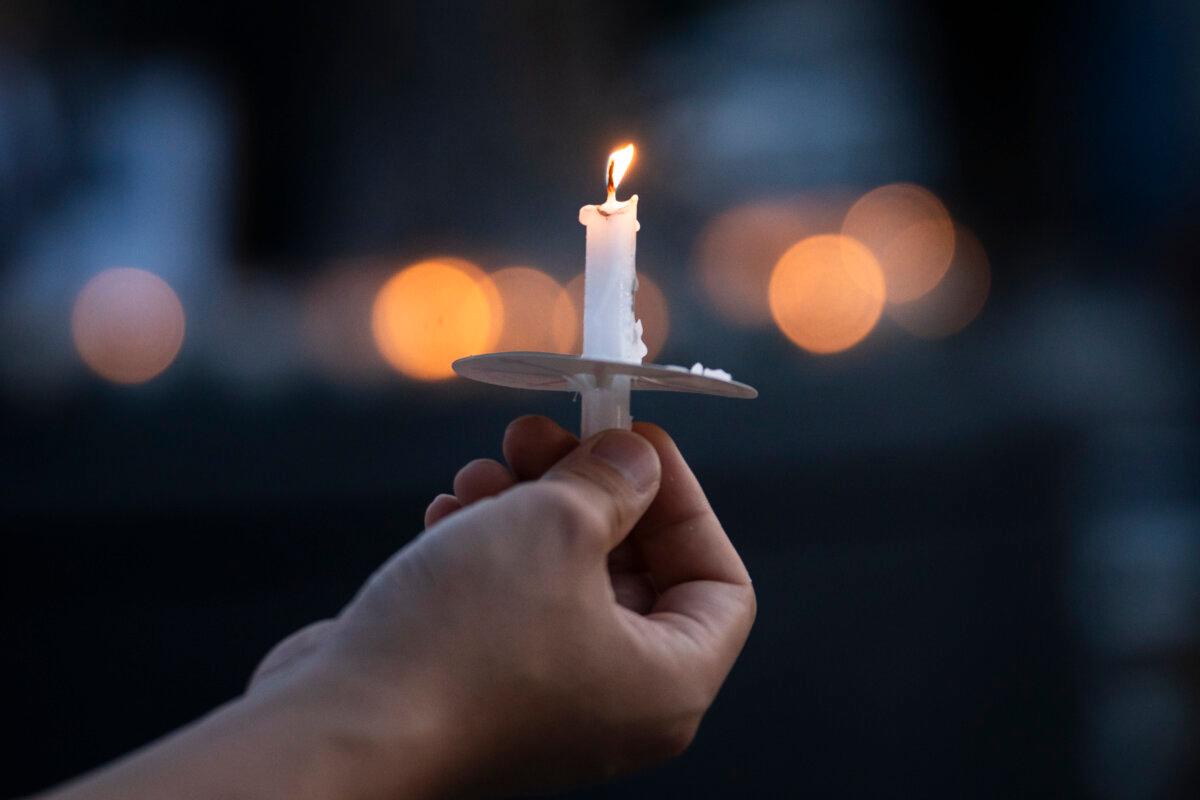 Tiananmen Square massacre candlelight vigil held at the Victims of Communism Memorial in Washington on June 4, 2026. (Madalina Kilroy/The Epoch Times)
