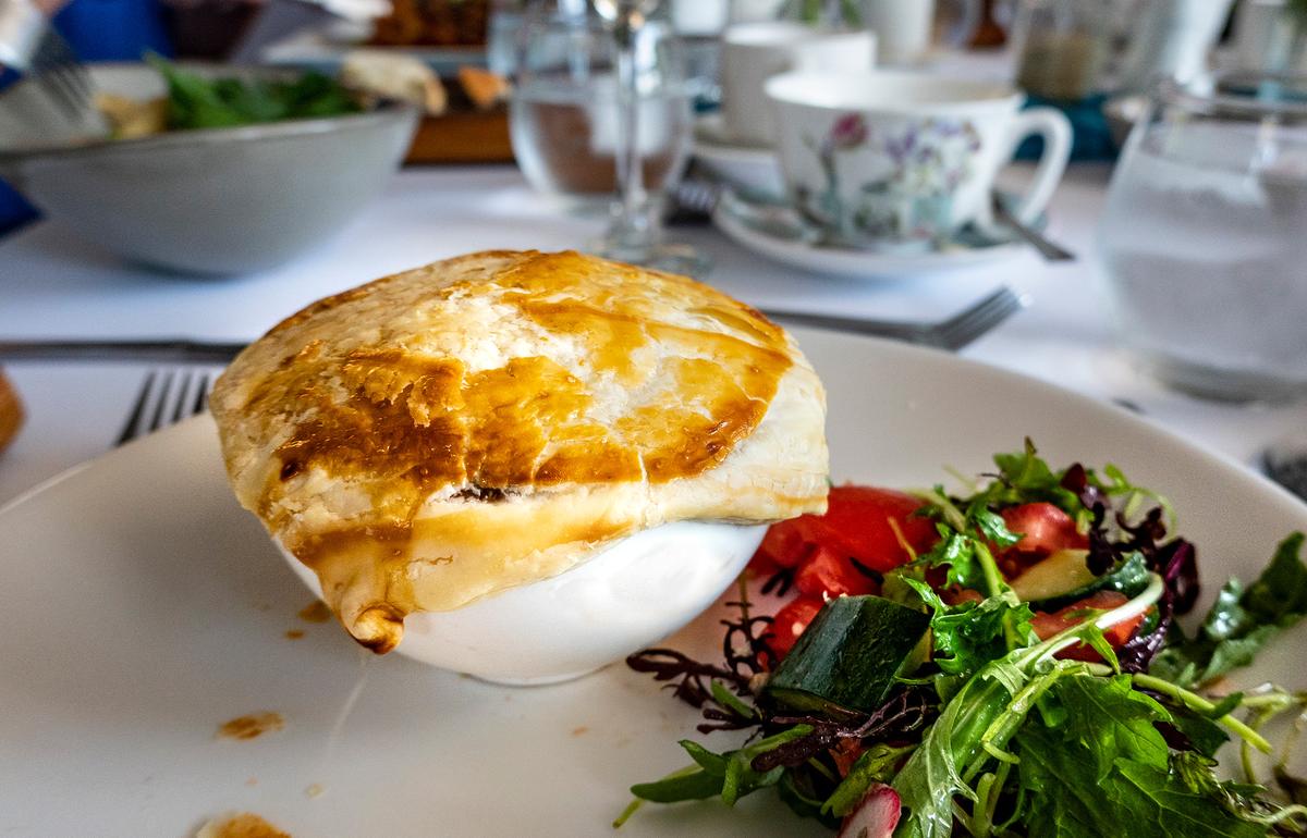 Meat pies are a popular everyday food in New Zealand. Their savory fillings are enclosed in flaky pastry and are best enjoyed served hot. (brittak/Getty Images)