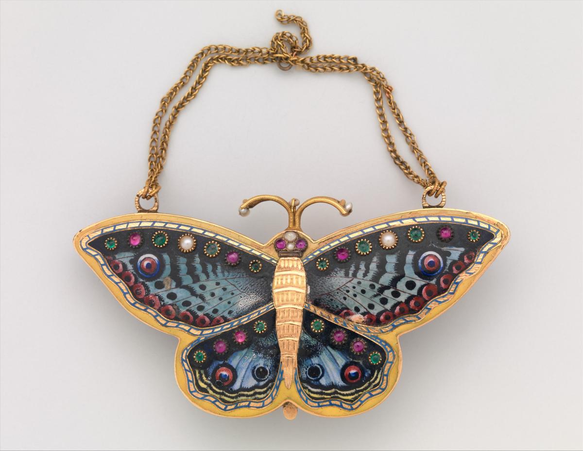 A watch in the form of a butterfly, circa 1840–1850, Swiss. Case of gold, enamel, and pearls; 2 5/8 inches by 1 1/4 inches. Metropolitan Museum of Art, New York City. (Public Domain)