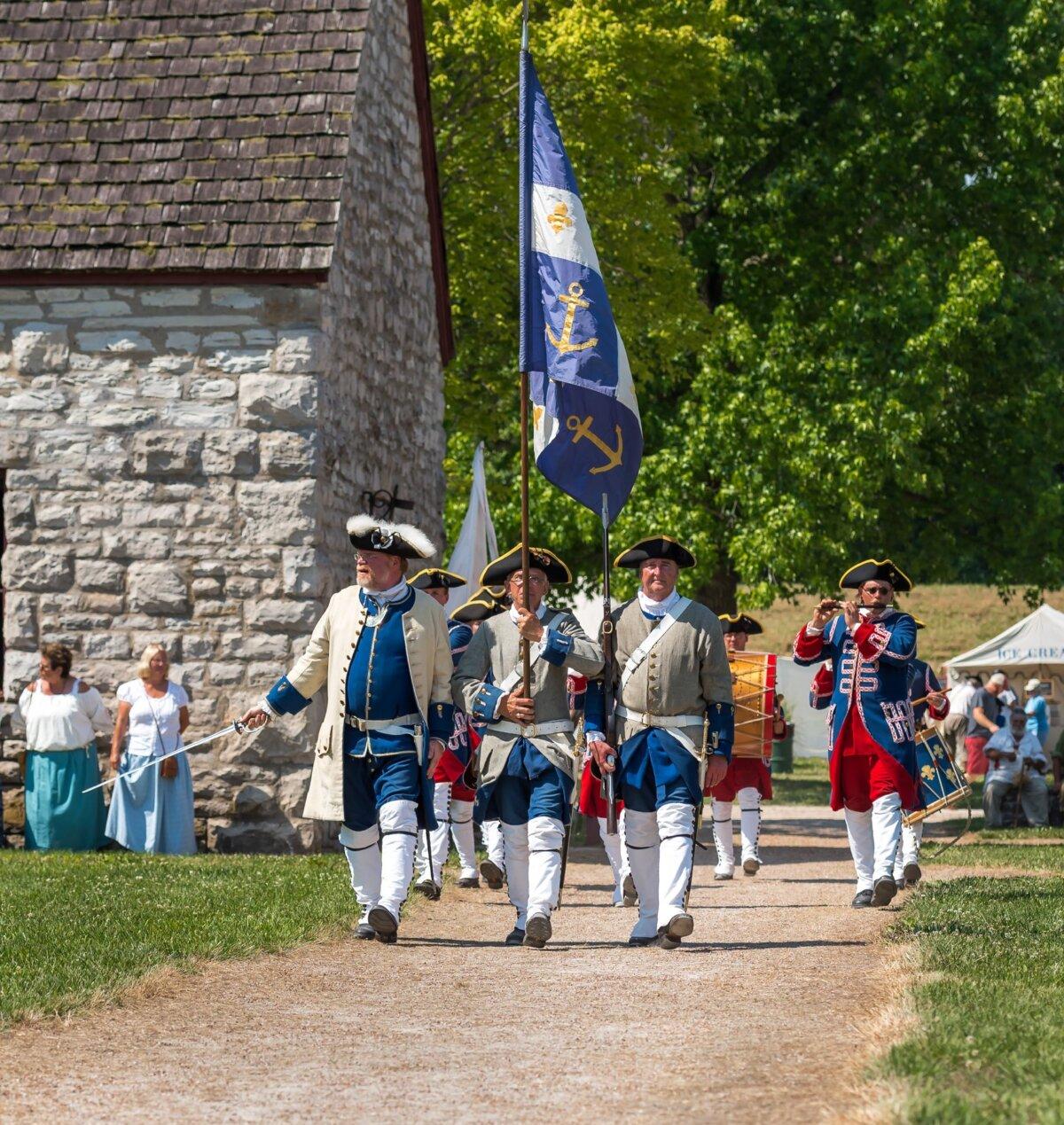 The French Colonial Color Guard at Fort de Chartres, just across the Mississippi River from St. Louis, performs for visitors. (Matthew Mansell/Dreamstime)