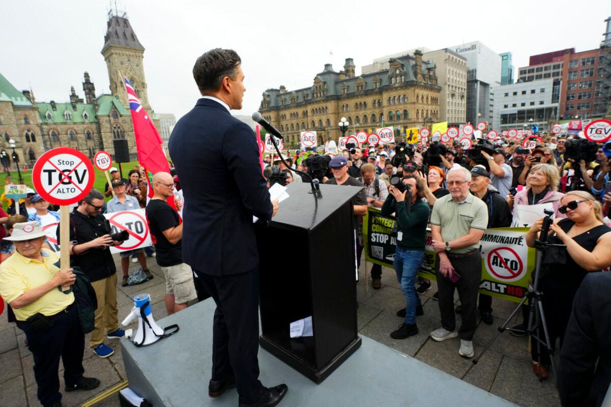 Conservative Leader Pierre Poilievre speaks at a rally in opposition to the Alto high-speed rail project as people gather on Parliament Hill in Ottawa on June 10, 2026. (The Canadian Press/Sean Kilpatrick)