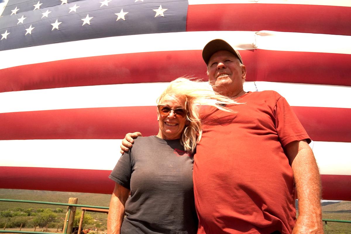 Phyllis and Wes Holmes, owners of Foothills Ranch in Mayer, Ariz., have been hosting a flag retirement ceremony on Flag Day for the past four years. Photo taken on June 14, 2026. (Allan Stein/The Epoch Times)