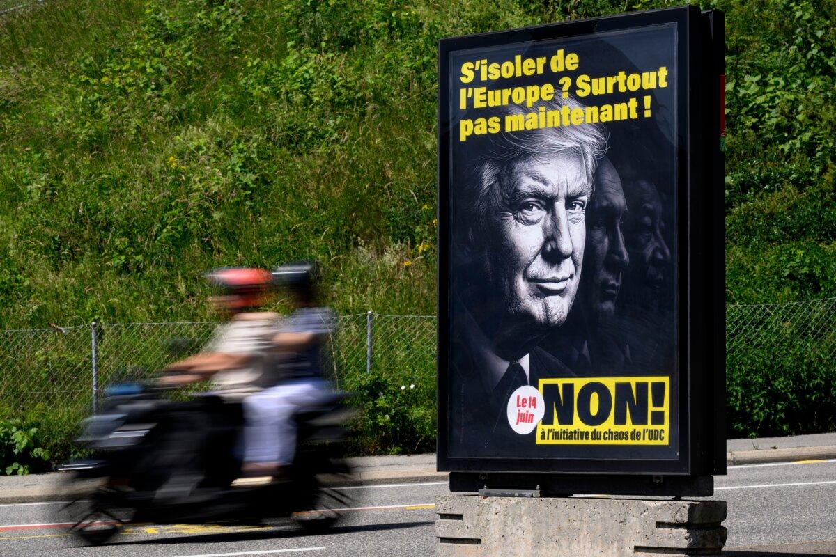 A poster reading "Isolate ourselves from Europe? Certainly not now! - No to the SVP/UDC Chaos initiative," photographed in Lausanne, May 27, 2026. (Laurent Gillieron/Keystone via AP)