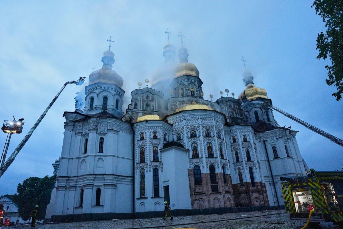 Workers fight a fire at the Kyiv-Pechersk Lavra, also known as the Monastery of the Caves, following a Russian strike in Kyiv, Ukraine, on June 15, 2026. (Efrem Lukatsky/AP Photo)