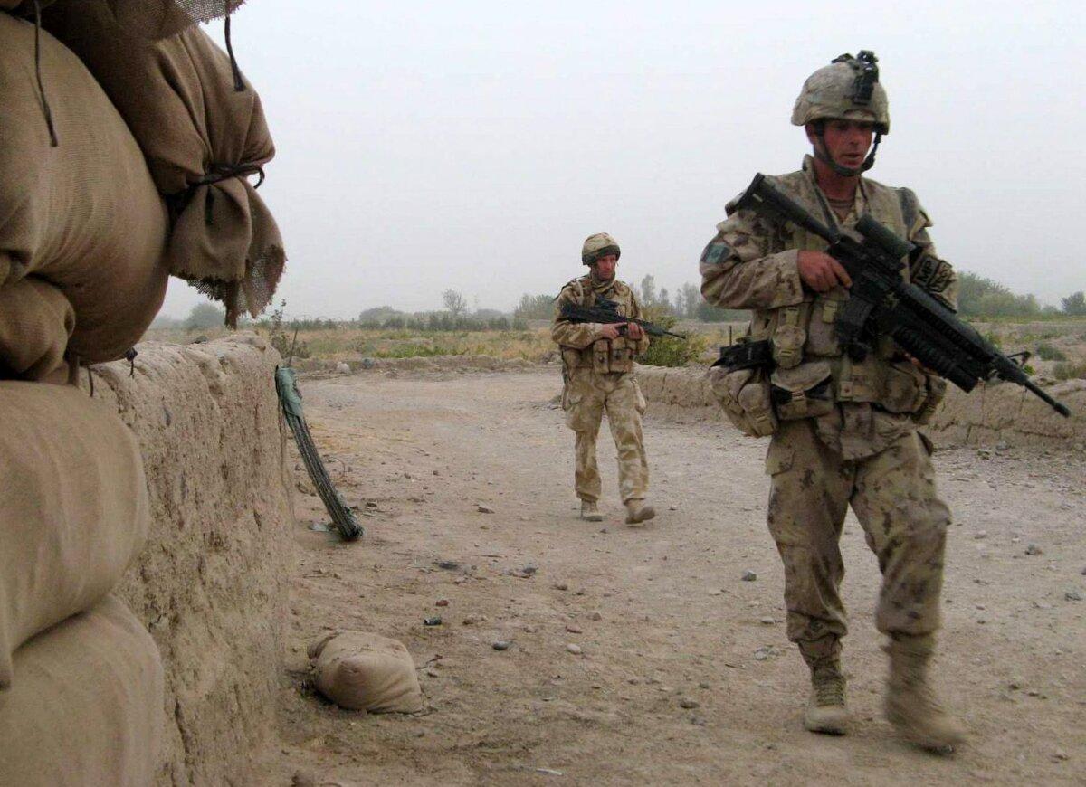 Canadian soldiers patrol in Pashmul, the area where Pte. Jess Larochelle fought off a Taliban attack in October 2006, in Afghanistan on Sept. 23, 2007. (The Canadian Press/Dene Moore)