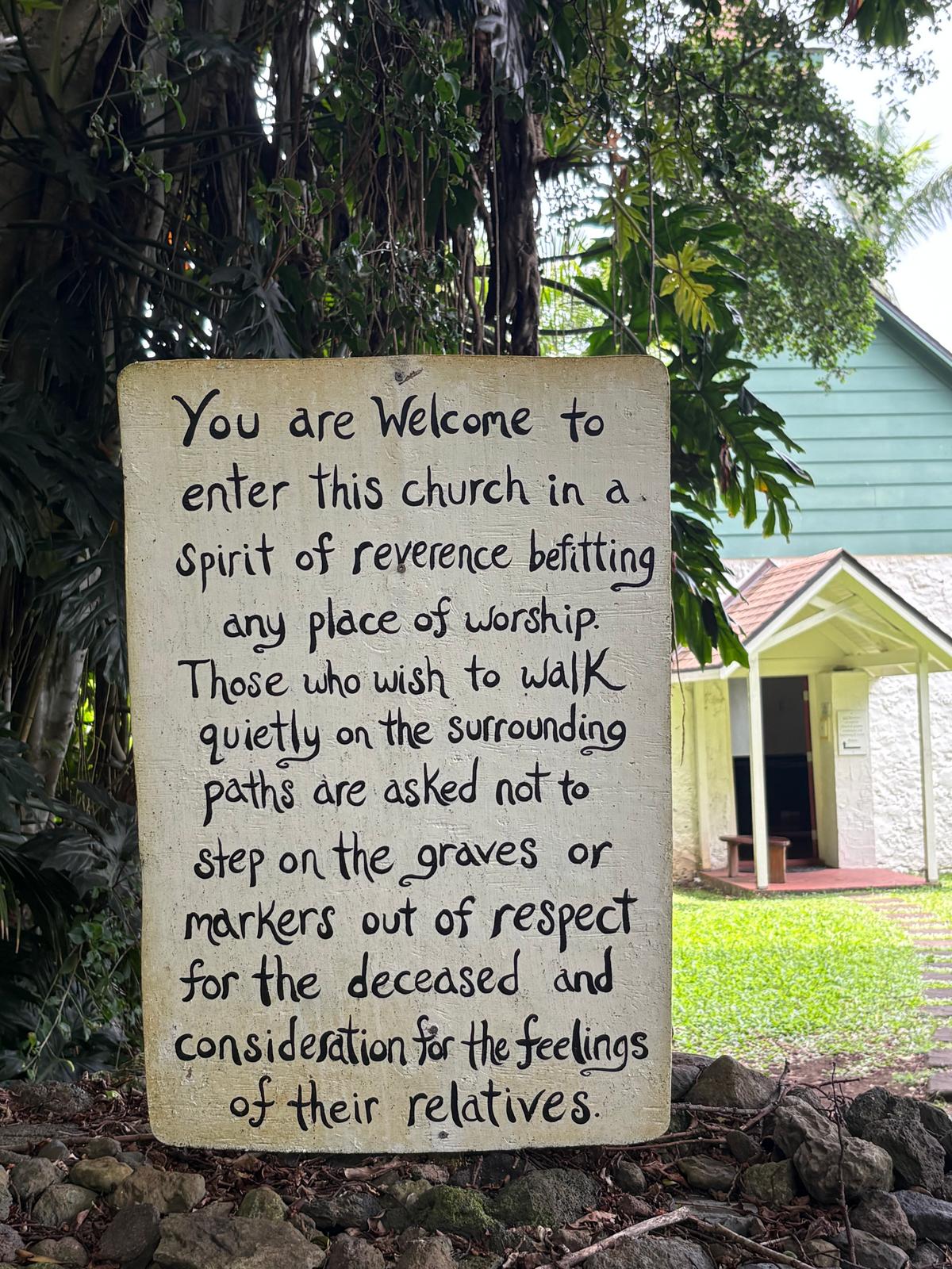 A sign requests respect and quiet from visitors to the graveyard. (Deena Bouknight)