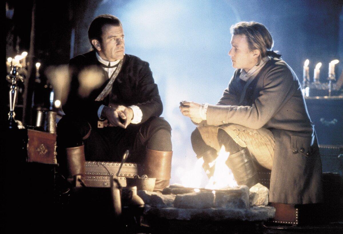 Benjamin Martin (Mel Gibson, L) and his son Gabriel (Heath Ledger), in "The Patriot." (Columbia Pictures)