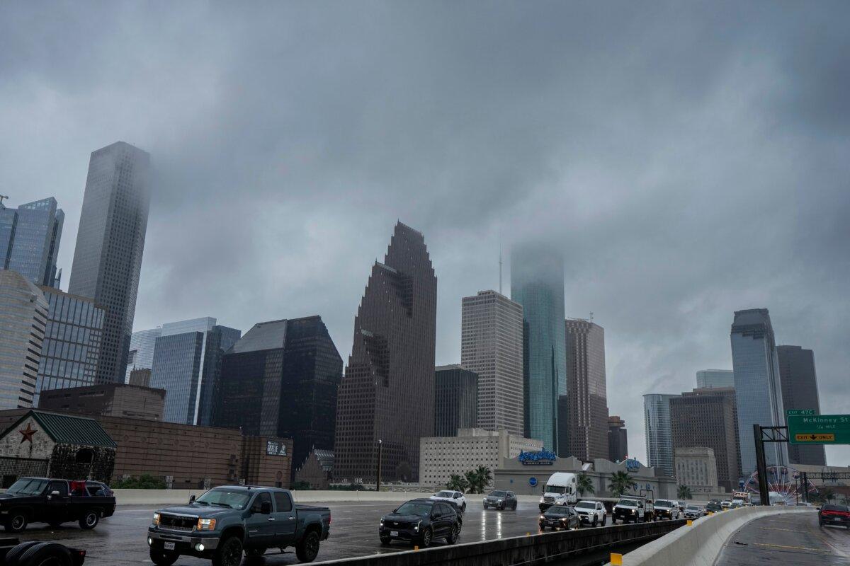 Low clouds over downtown Houston are produced by tropical weather in the Gulf of America on June 17, 2026. (Brett Coomer/Houston Chronicle via AP)