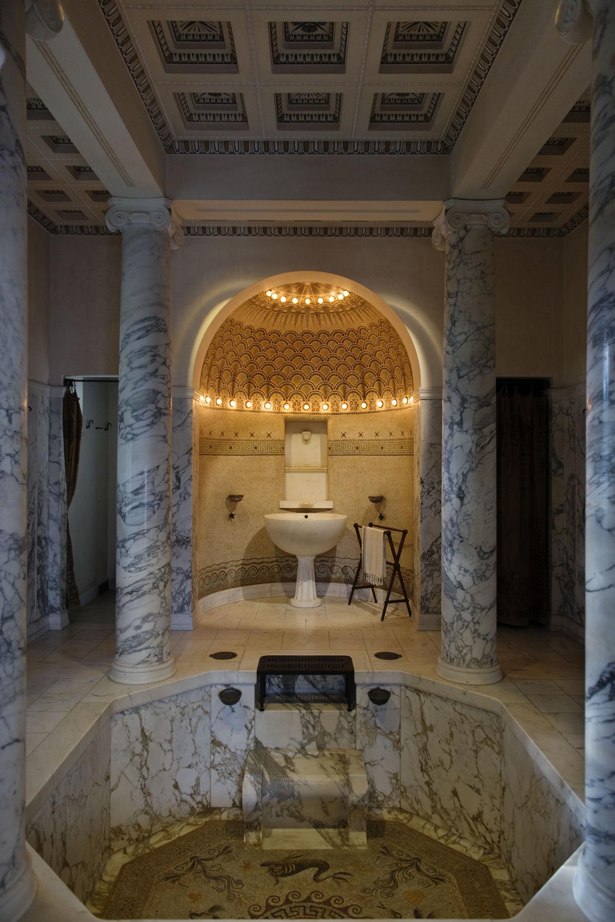 The villa was built with early 20th-century modern plumbing and heating. The ground-level “balaneion,” or bathroom, is dedicated to the naiads, female water nymphs. At its center is a luxurious sunken bath with a beautiful mosaic. The ancient Greeks valued bathing as an important ritual, and all of the villa’s bathrooms display the liberal use of marble and mosaics. (Colombe Clier /Center of National Monuments)