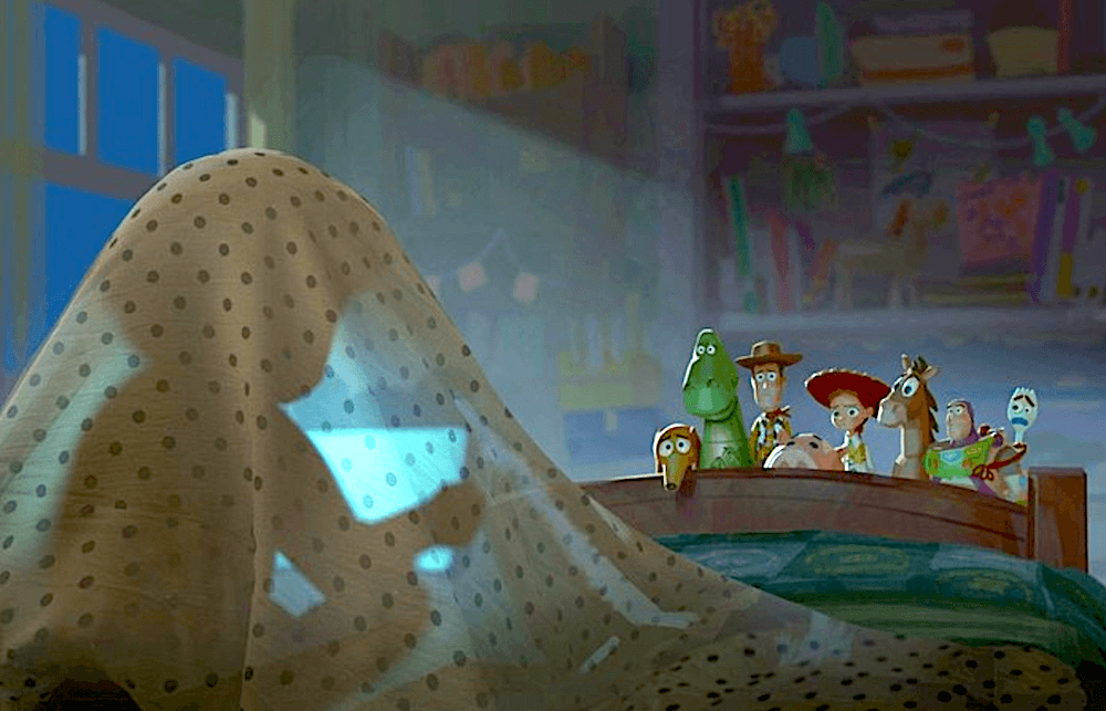 Bonnie (voiced by Scarlett Spears) being observed staying up too late and looking at her new tablet by a bunch of her concerned toys, in "Toy Story 5." (Walt Disney Studios Motion Pictures)