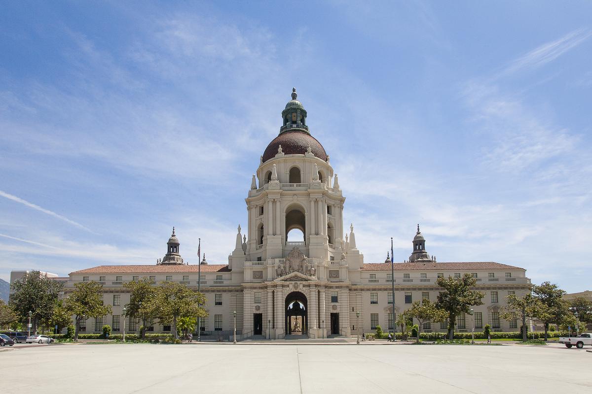 The front façade of Pasadena City Hall displays symmetry, one of the main beaux arts characteristics. Smaller towers, as well as the building’s windows and doors, are balanced on each side of the arched entryway, which is topped with an arched and columned tower and cupola. (Dedo Luka/Shutterstock)