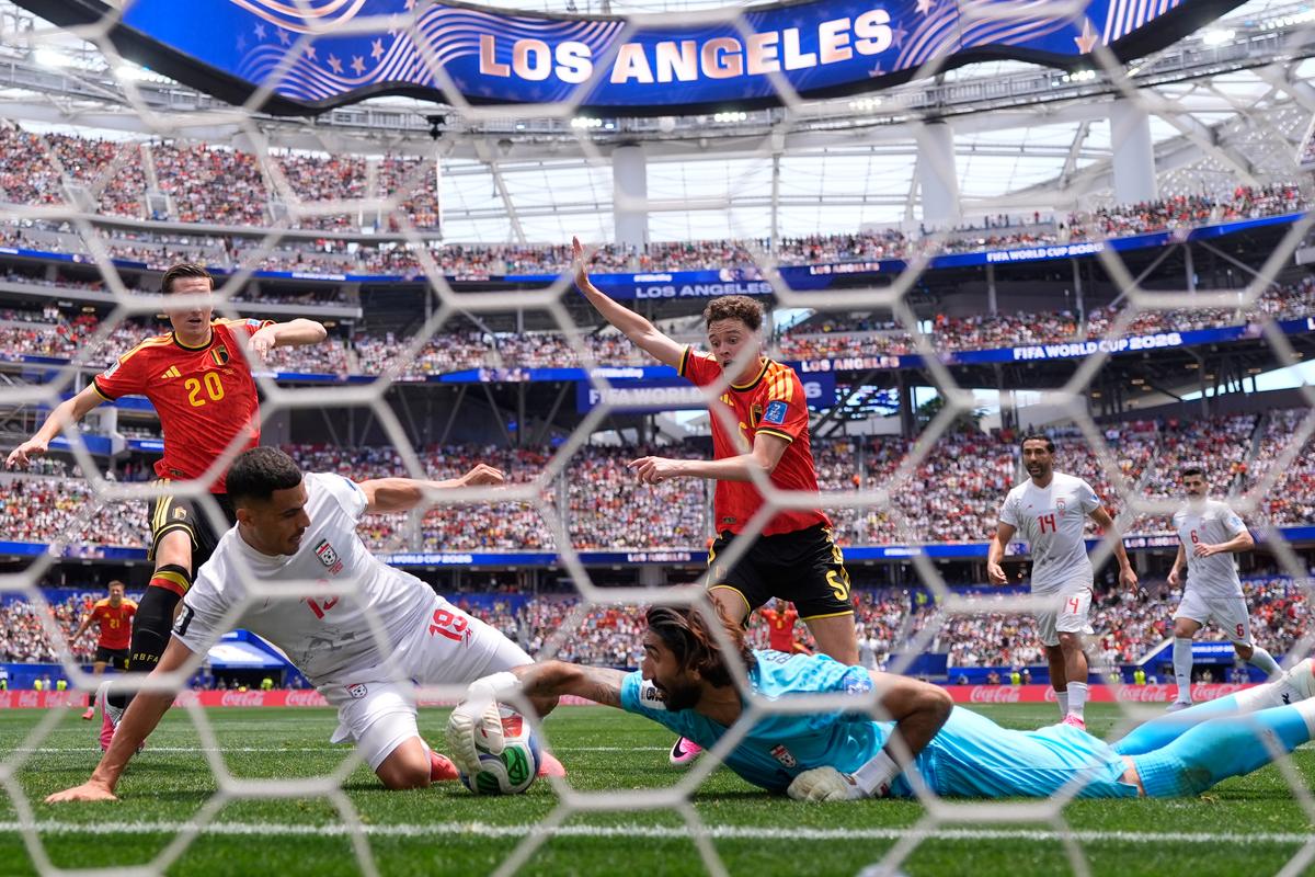 Iran goalkeeper Alireza Beiranvand makes a save against Belgium during their soccer World Cup match in Inglewood, Calif., on June 21, 2026. (Mark J. Terrill/AP)