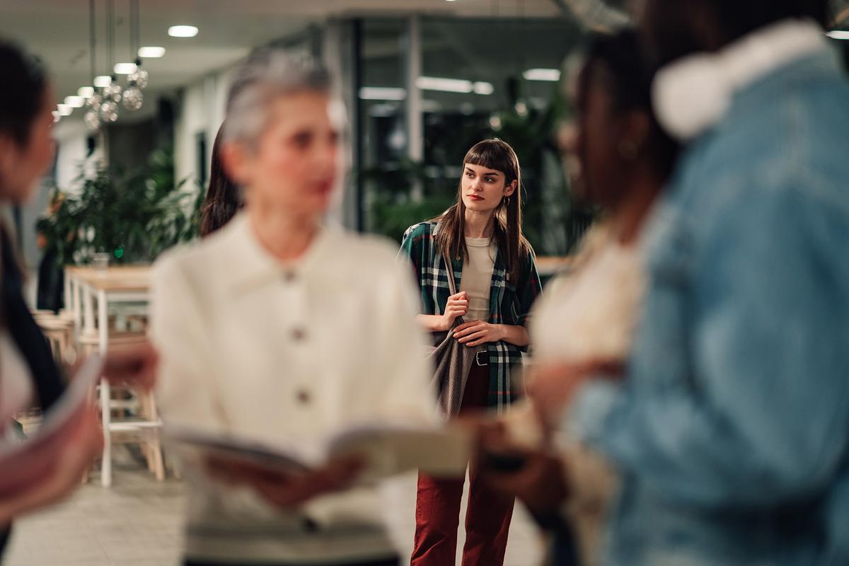 Feeling nervous before entering a social event is a common experience, and many people find that anxiety decreases once conversations begin. (Noko LTD/Getty Images)