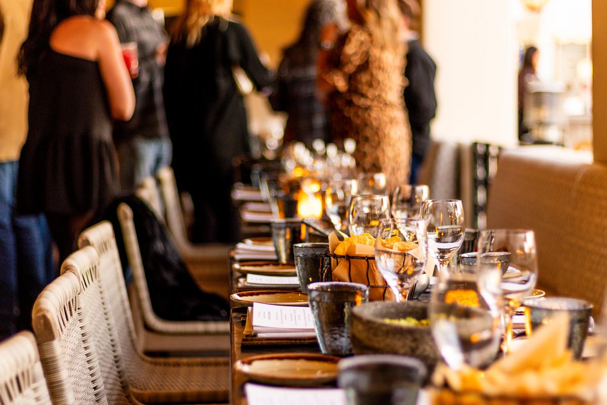 Arriving early can make social events feel less intimidating because conversations usually begin in small groups before the crowd grows. (Bryan C Nelson/Getty Images)