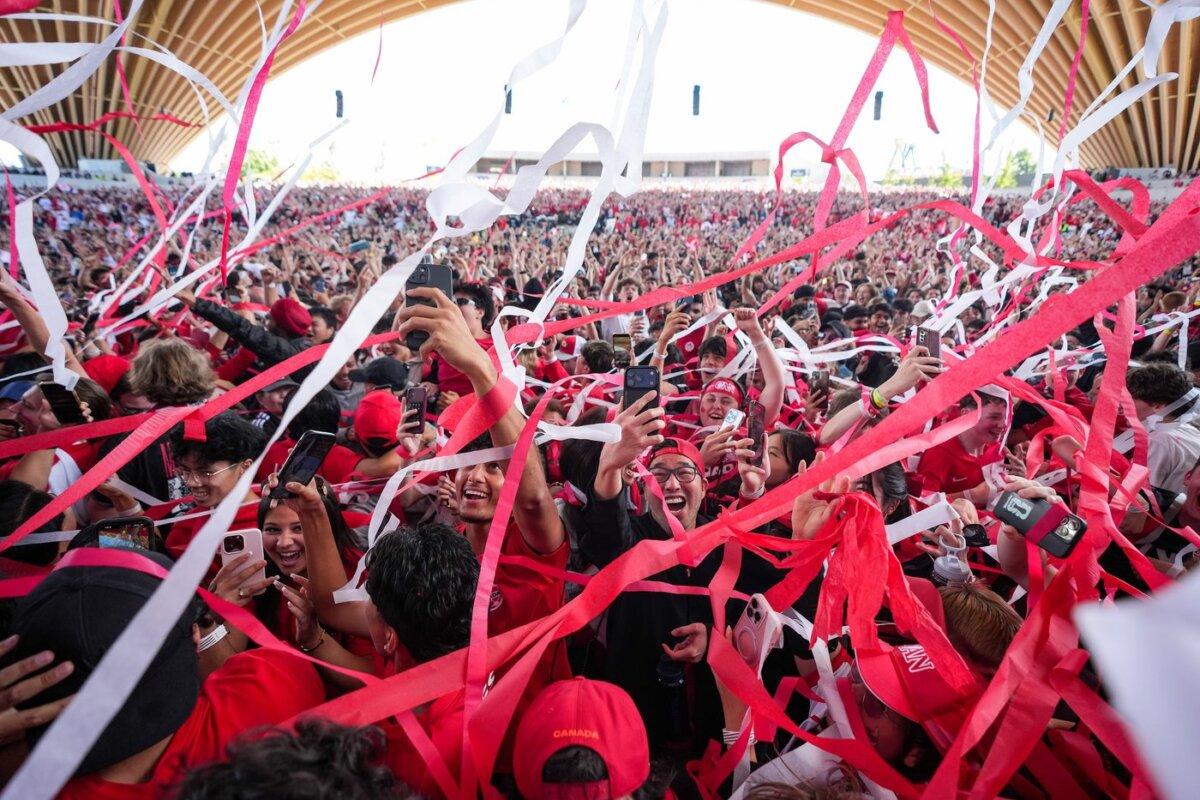 Canadian fans celebrate after Canada defeated South Africa during a World Cup Round of 32 soccer match, at FIFA Fan Fest in Vancouver on June 28, 2026. (The Canadian Press/Darryl Dyck)