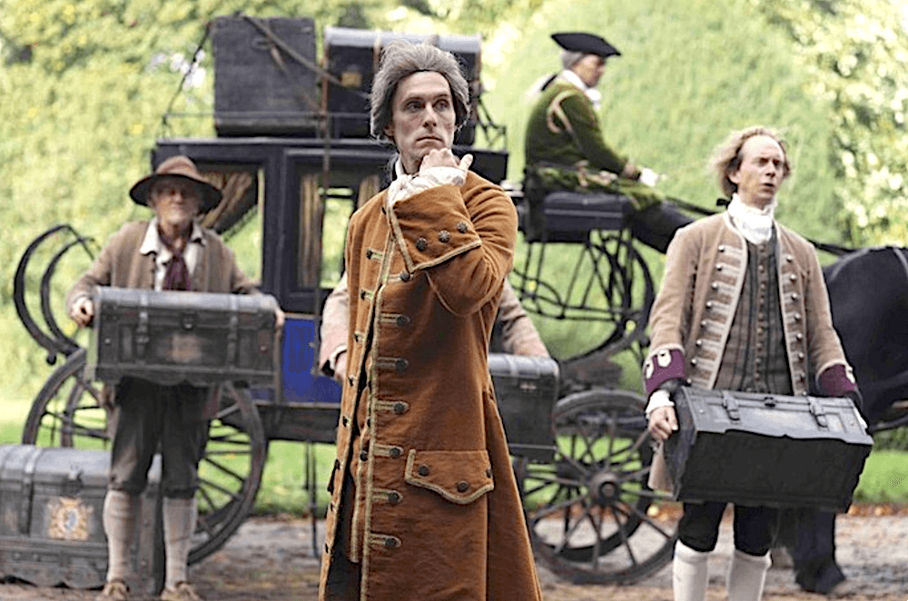 Footman Reginald Halifax (Jack Farthing, center) oversees the prohibitively expensive spiffing-up of the Savage estate, in "Savage House." (Dean Rogers/Paramount Picture)