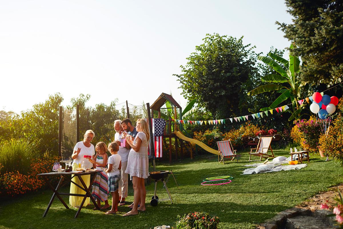 A beverage station with infused water, lemonade, and glasses will help guests stay hydrated, particularly on hot afternoons. (vgajic/Getty Images)