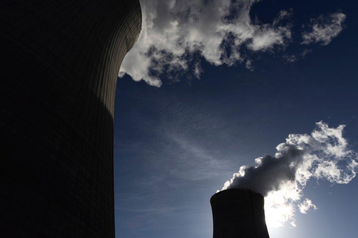 The cooling towers for units 4 (L) and 3 (R) at Plant Vogtle, operated by Georgia Power Co., in east Georgia's Burke County near Waynesboro, Ga., on May 29, 2024. (Arvin Temkar/Atlanta Journal-Constitution via AP)