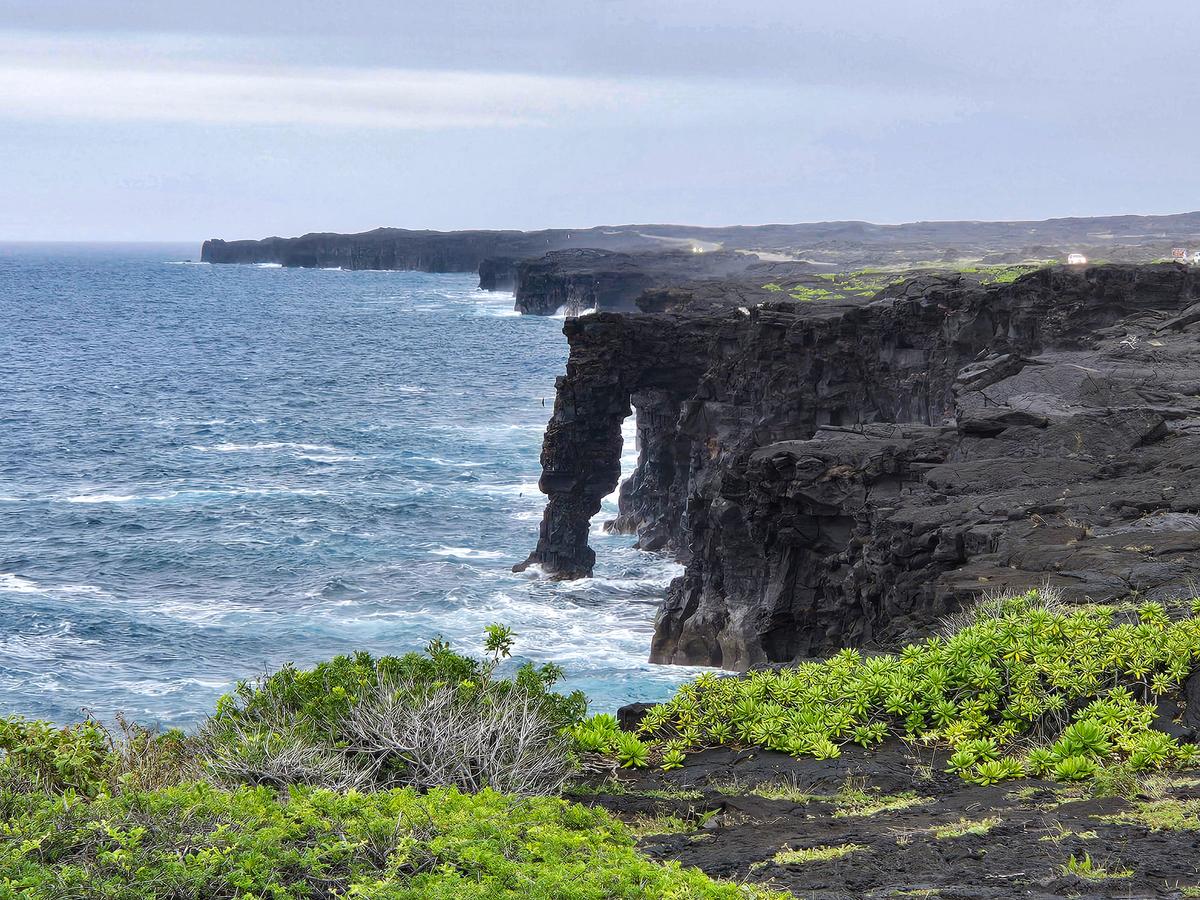 Ocean waves continuously erode ancient lava flows on Hawaii's costaline, creating dramatic sea arches, caves, and blowholes. (Kevin Revolinski)