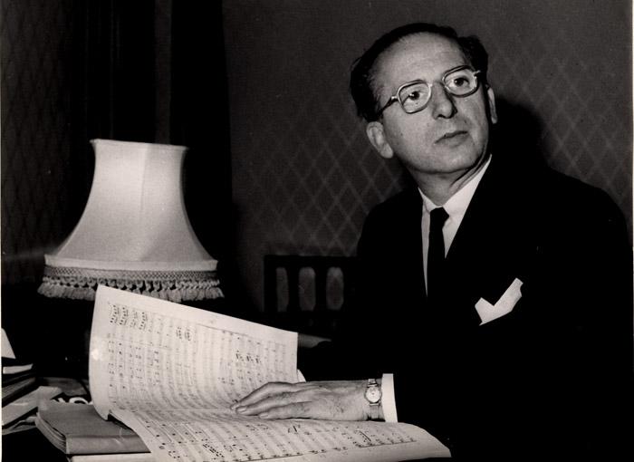 Franz Waxman at work on a movie score. (Public Domain)
