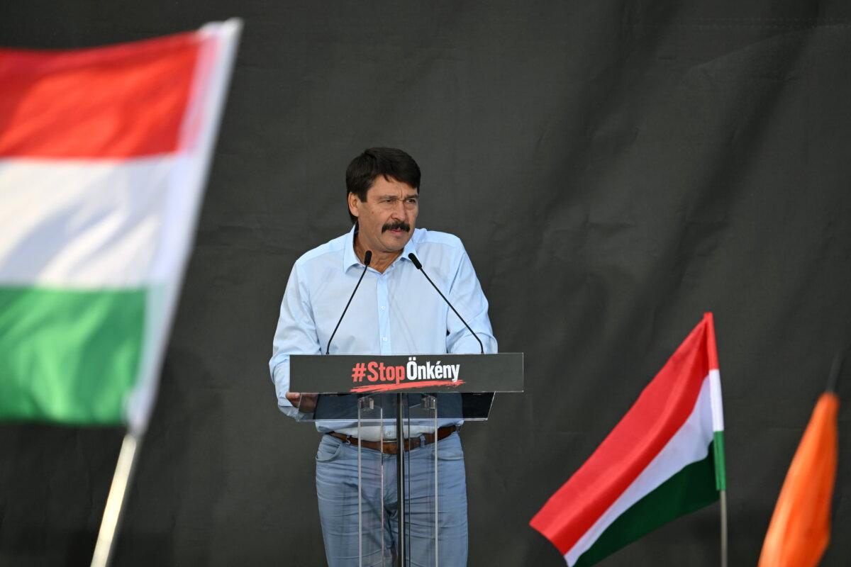 Former Hungarian President Janos Ader speaks during a protest held by Fidesz and KDNP against the amendment of the Basic Law, in front of the presidential Sándor Palace in Budapest, Hungary, on July 9, 2026. (Tibor Illyes/MTI via AP)