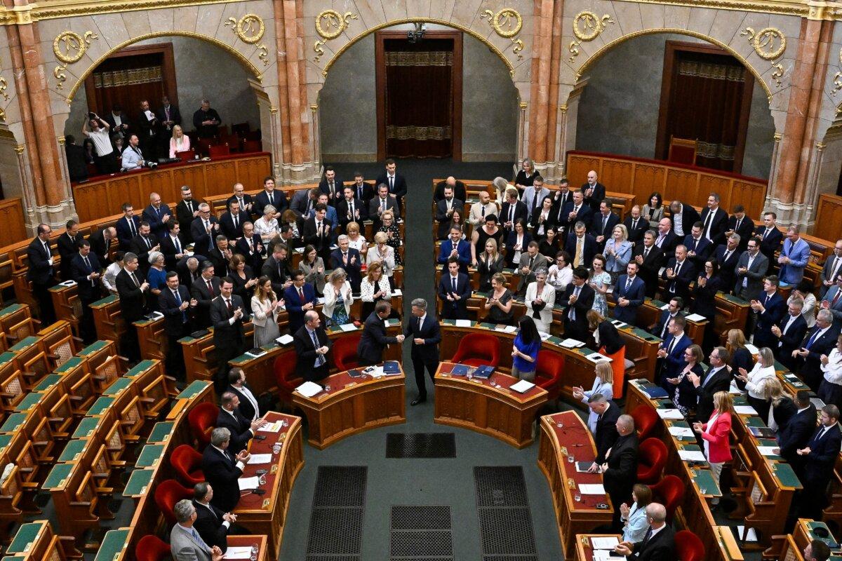 Deputies vote on the 17th amendment to the Fundamental Law at the plenary session of the parliament in Budapest, Hungary, on July 13, 2026. (Robert Hegedus/MTI via AP)