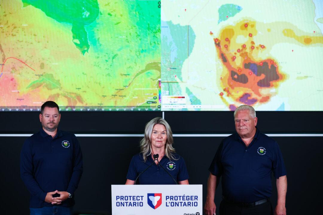 Fire Crews Currently Fighting Roughly 190 Wildfires, Half Out of Control, Officials Say