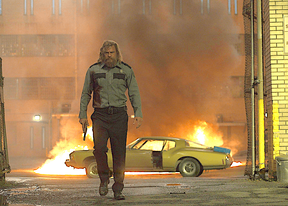 John Miller (Alan Ritchson) breaks out of prison in "Motor City." (Stampede Ventures/Independent Film Company)