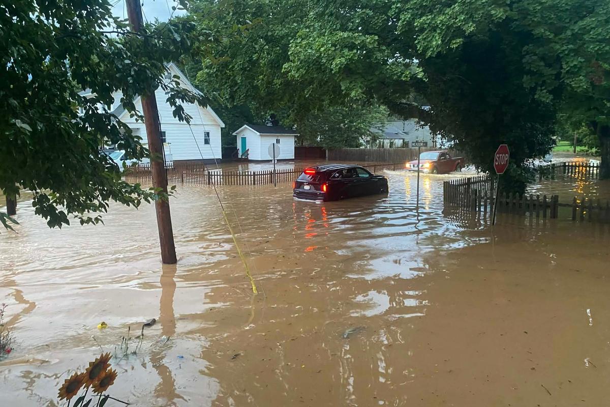This photo provided by Joe Kinzer shows flash flooding on July 21, 2026, in Buckhannon, W.Va. (Joe Kinzer via AP)