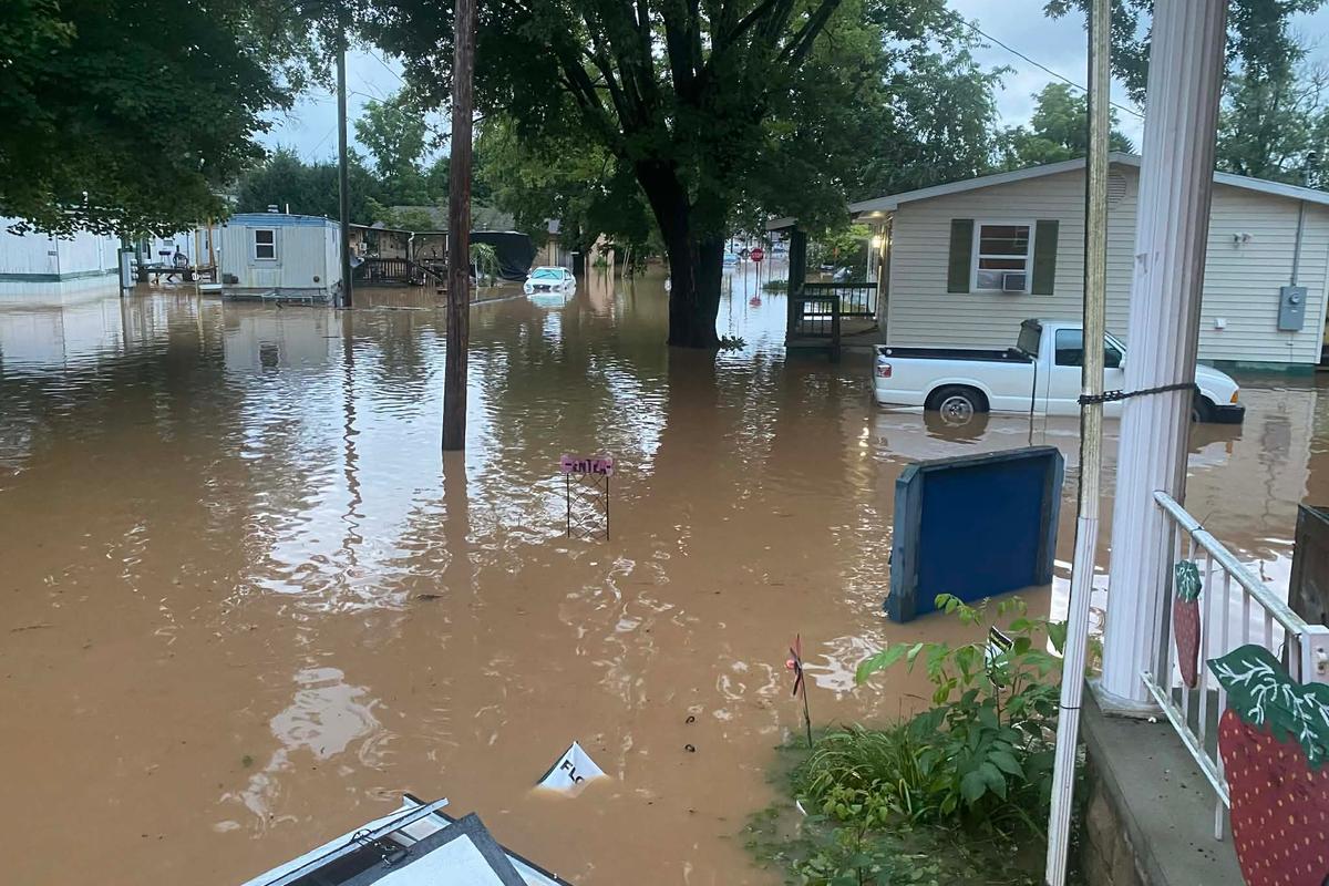 This photo provided by Joe Kinzer shows flash flooding on July 21, 2026, in Buckhannon, W.Va. (Joe Kinzer via AP)