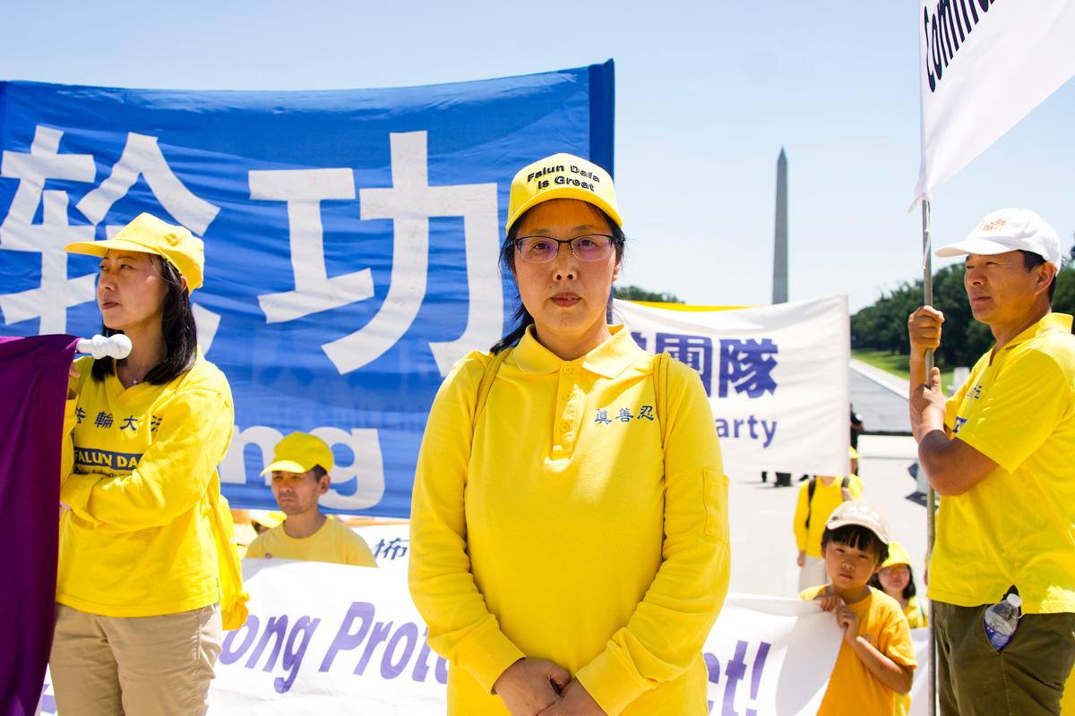 Lydia Dong at a Falun Gong rally at the Lincoln Memorial in Washington, on July 23, 2026. (Karina Li for The Epoch Times)