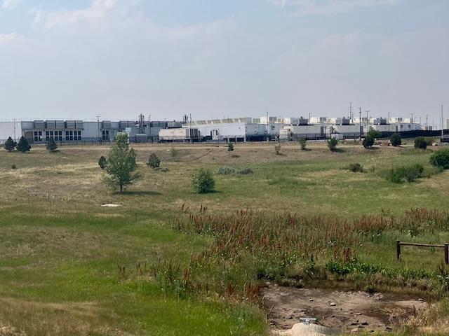Microsoft’s massive Azure data center in Bison Business Park in Cheyenne, Wyo., in late July 2026. The data center is one of four campuses Microsoft operates in Cheyenne, where the hyperscaler plans to dramatically expand after the Cheyenne City Council approved a controversial 3,460-acre annexation in June. (John Haughey/The Epoch Times)