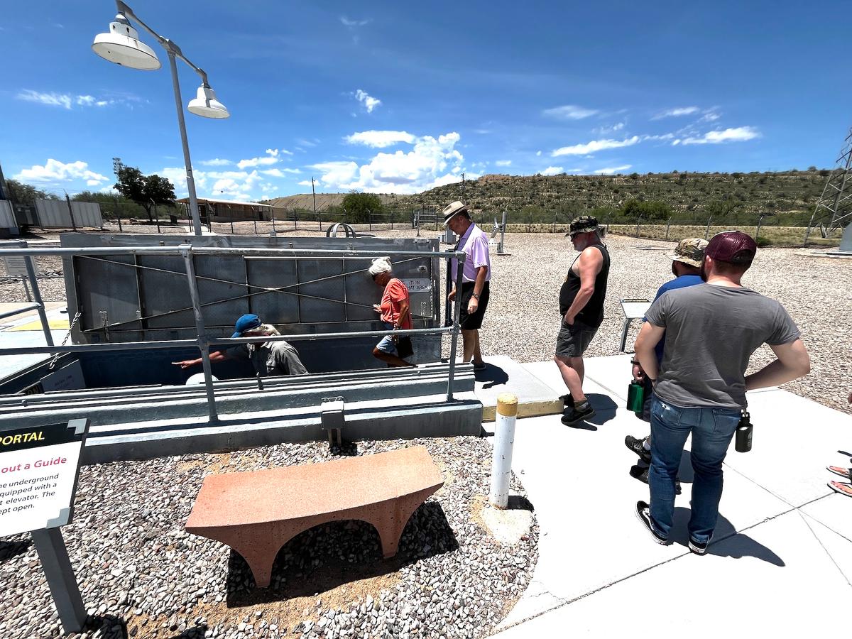Visitors enter an underground former missile launch complex at the Titan Missile Museum in Green Valley, Ariz., on July 24, 2026. (Allan Stein/The Epoch Times)