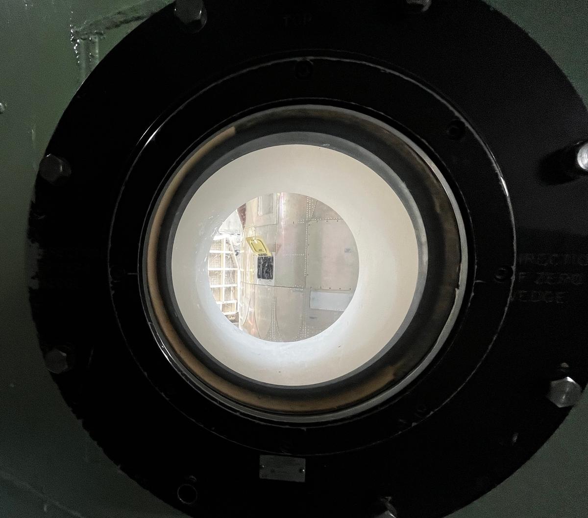 A deactivated Titan II missile as viewed through a porthole inside the missile silo on July 24, 2026. (Allan Stein/The Epoch Times)