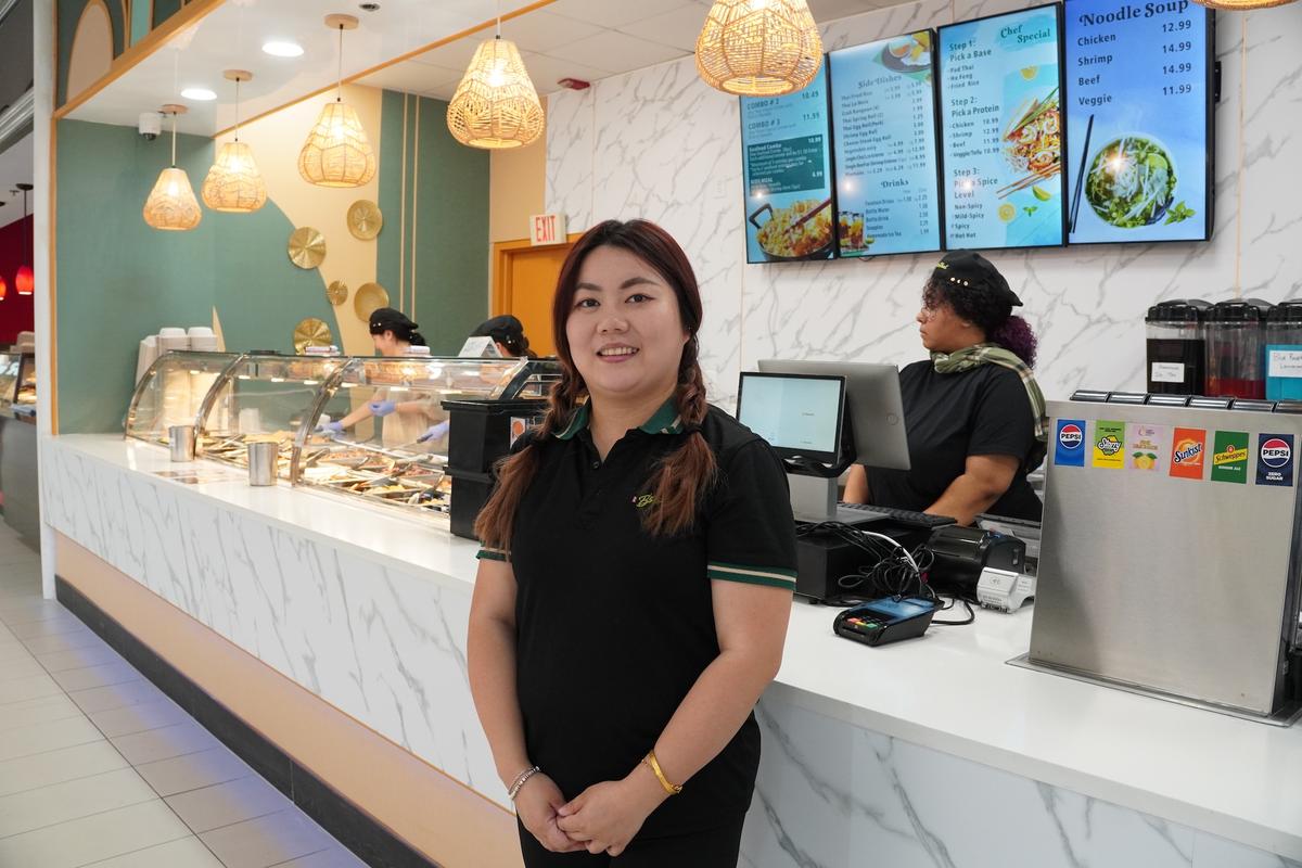 Business owner Qiao Lin in front of Sam Bistro Thai in the Galleria at Crystal Run mall in Wallkill, N.Y., on July 24, 2026. (Oliver Mantyk/The Epoch Times)