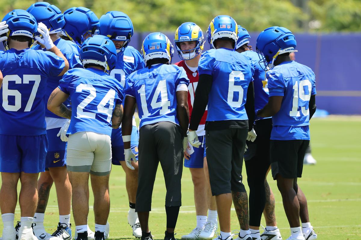 Ty Simpson (15) of the Los Angeles Rams calls a play in the huddle during organized team activities workout at Rams Village at the Warner Center in Woodland Hills, Calif., on June 2, 2026. (Kevin Terrell/Getty Images)