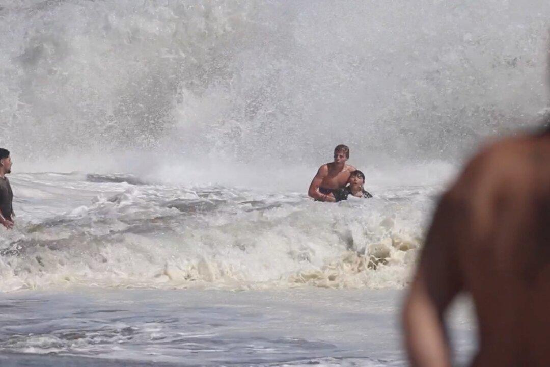 Boy Rescued From Rough Surf at California Beach