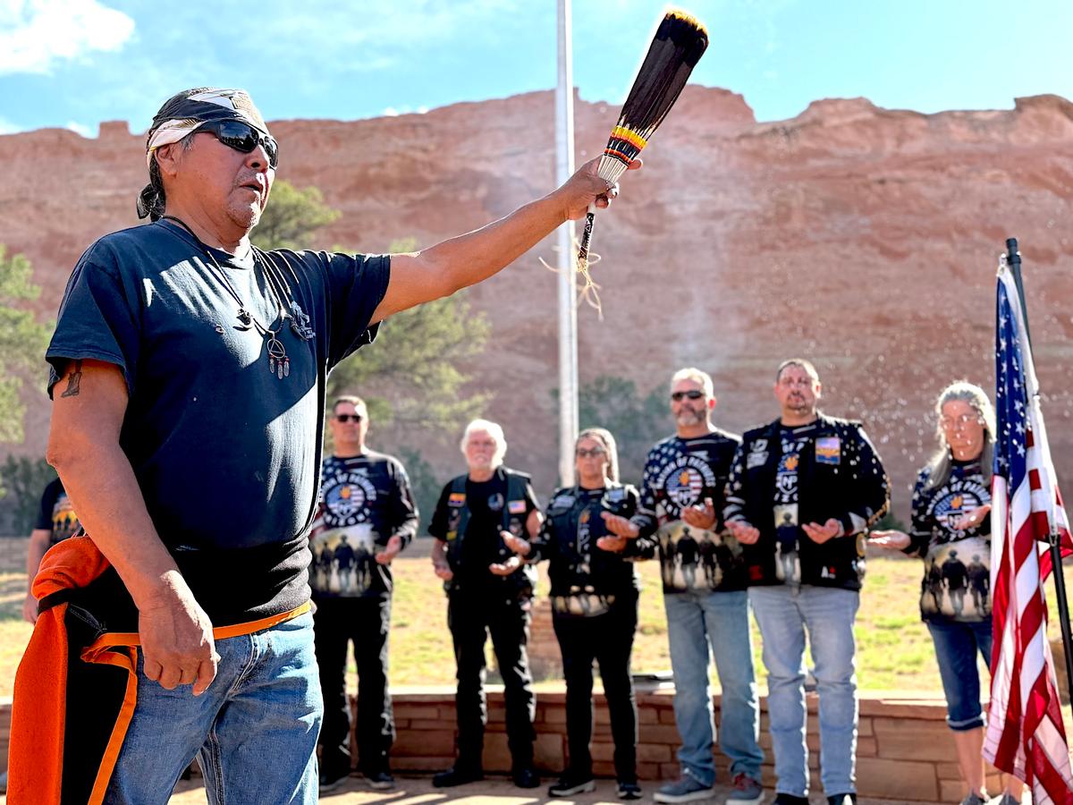 Army veteran Patrick Arthur conducts the traditional blessing of the veterans in the Navajo language in Window Rock, Ariz., on July 28, 2026. (Allan Stein/The Epoch Times)
